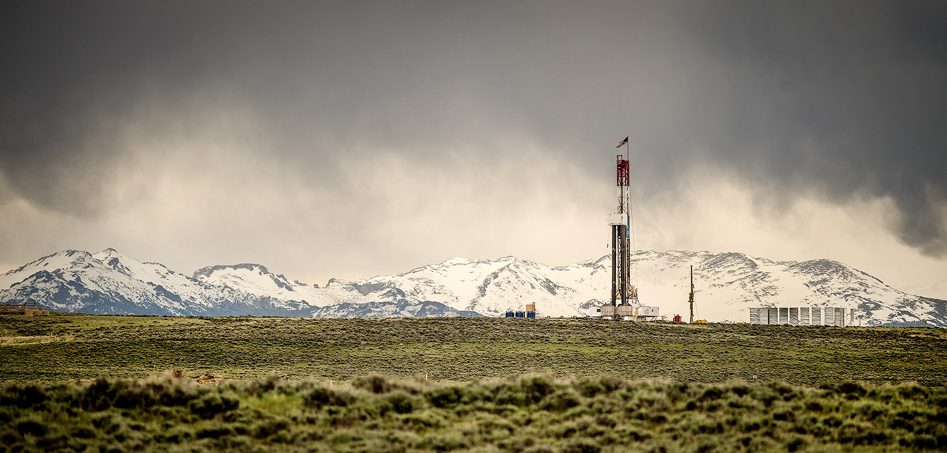 Drilling Rig and Wyoming Mountains