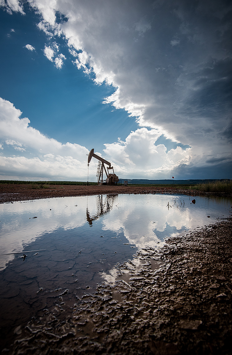 Oil Well Pump Reflection with Clouds