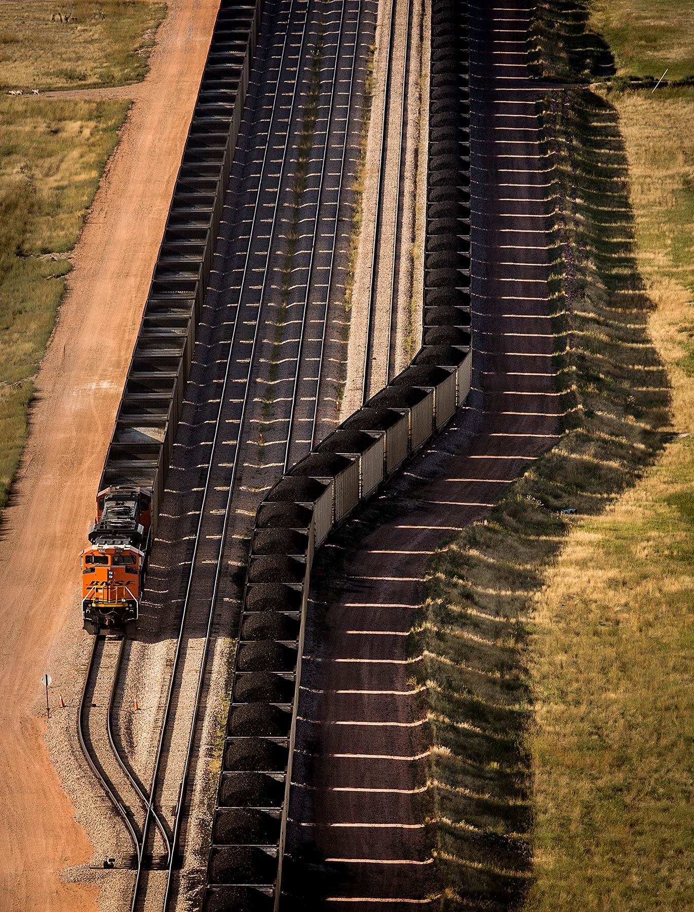 Train at Coal Plant Photograph