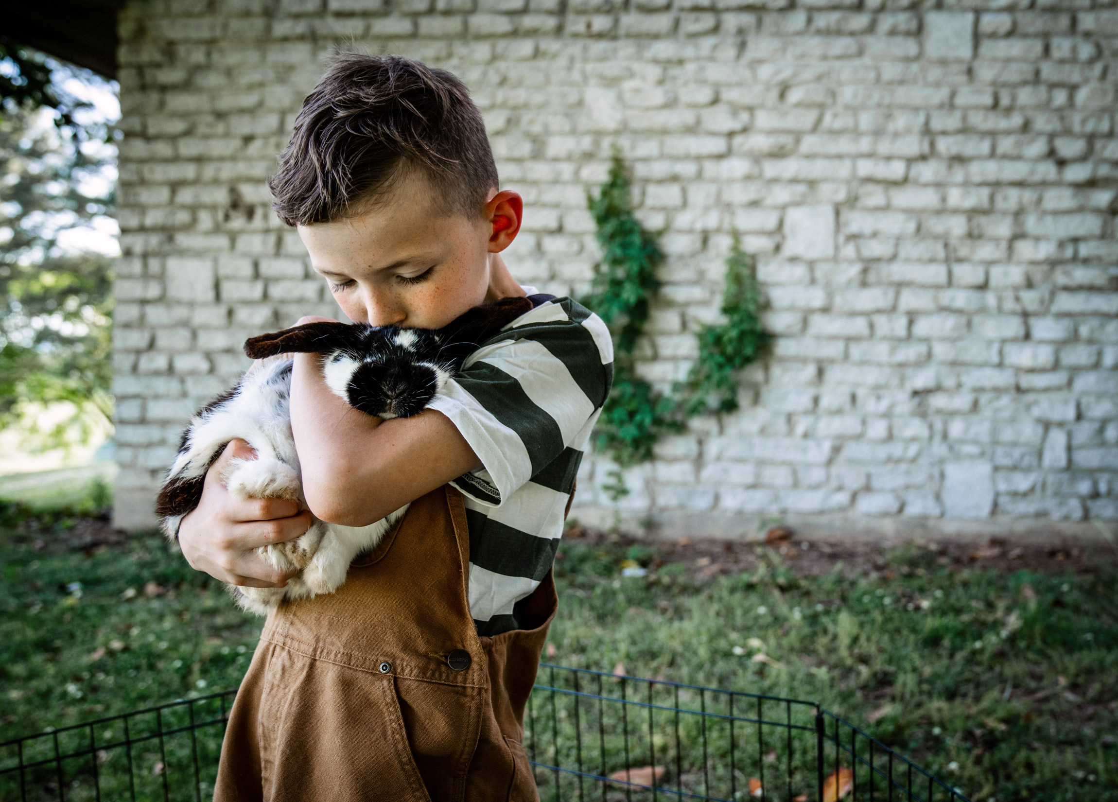 Boy with Pet Rabbit Photo