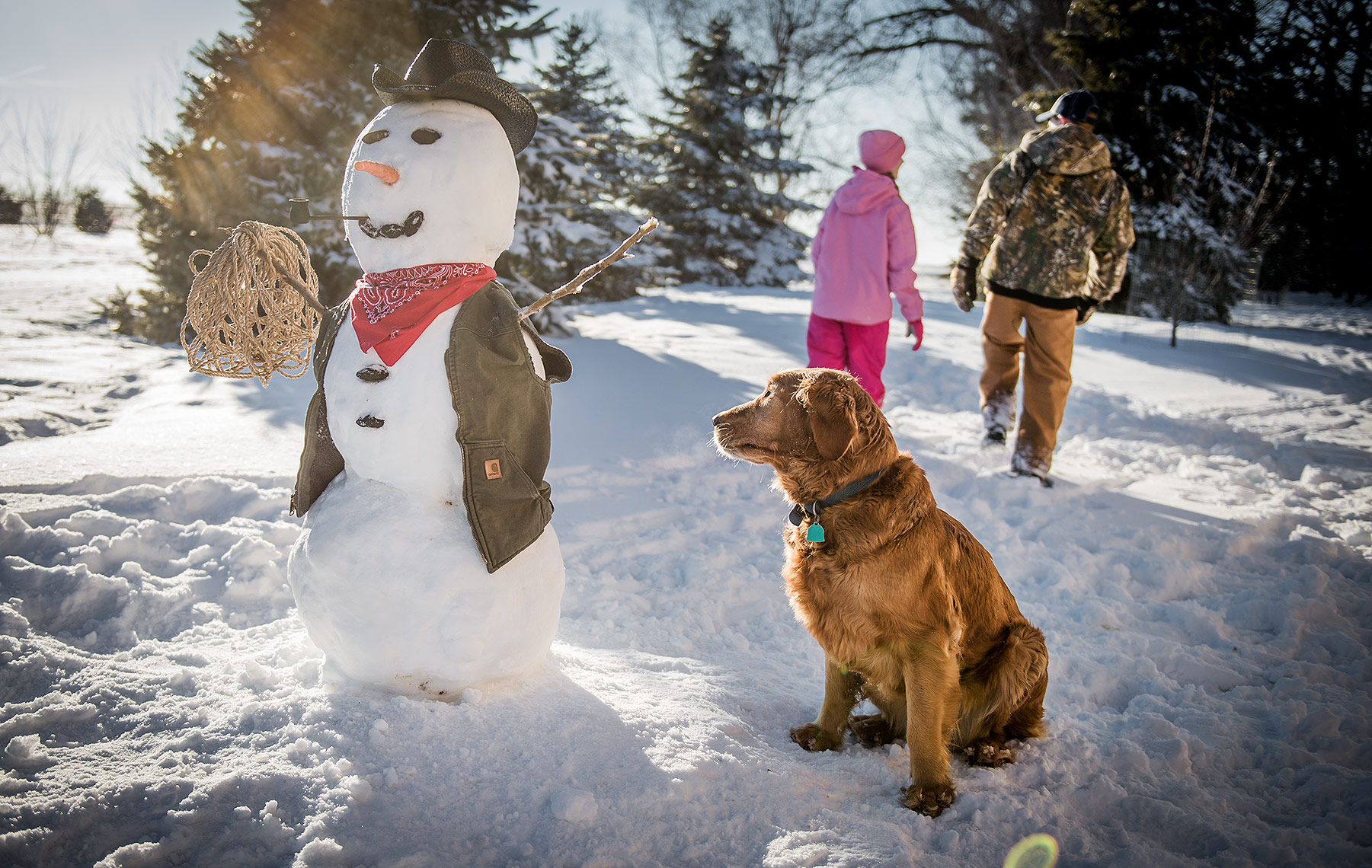 Dog and Snowman in Winter