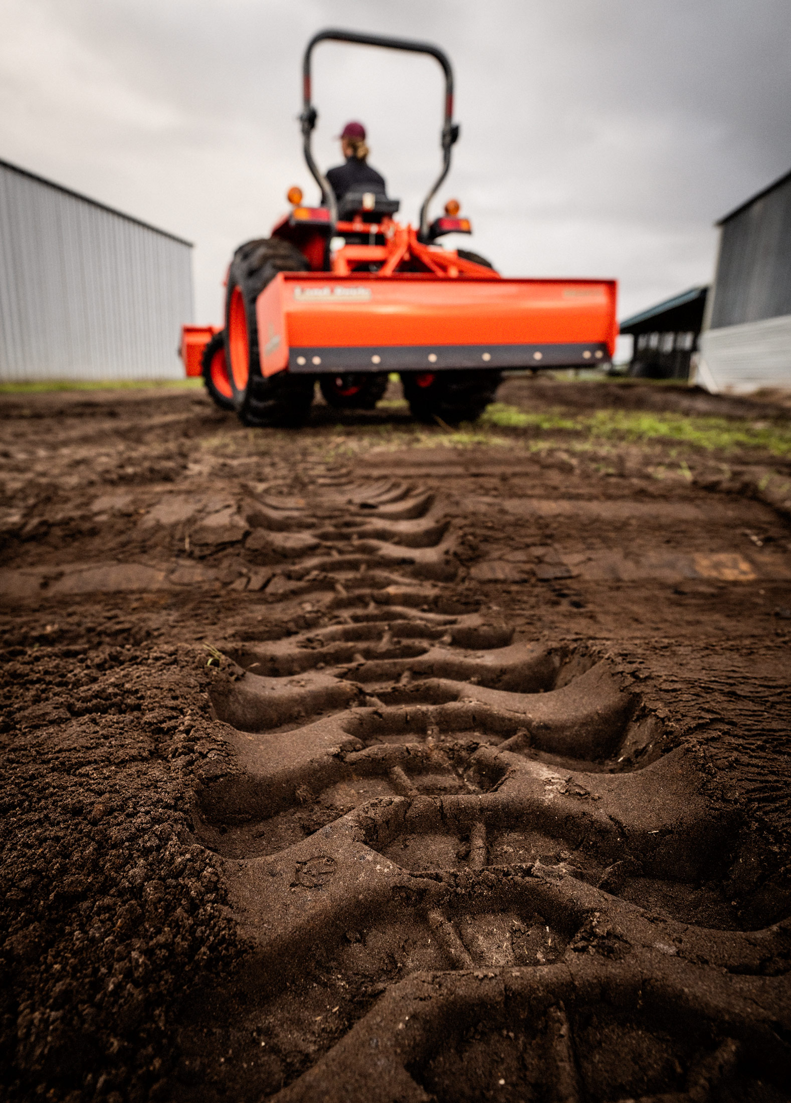 Tractor Tire Tread in Dirt Photo