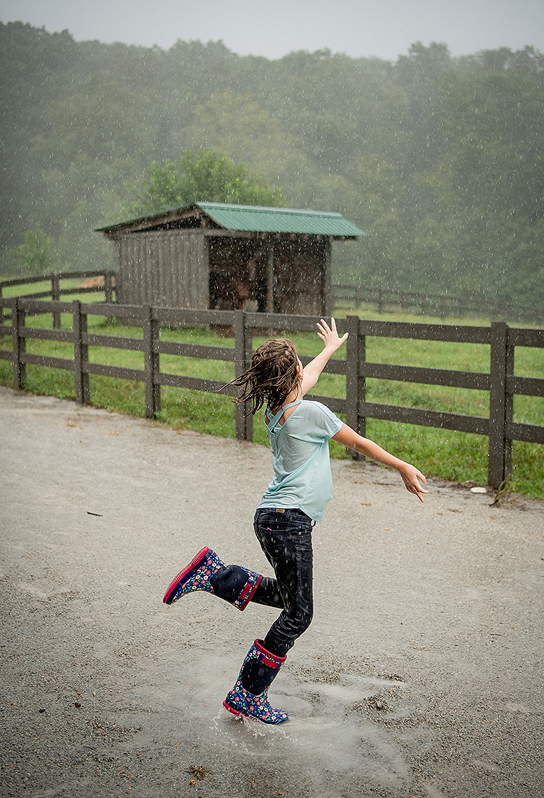 Girl Dancing in the Rain