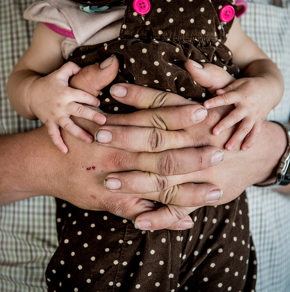 Father and Daughter with Hands