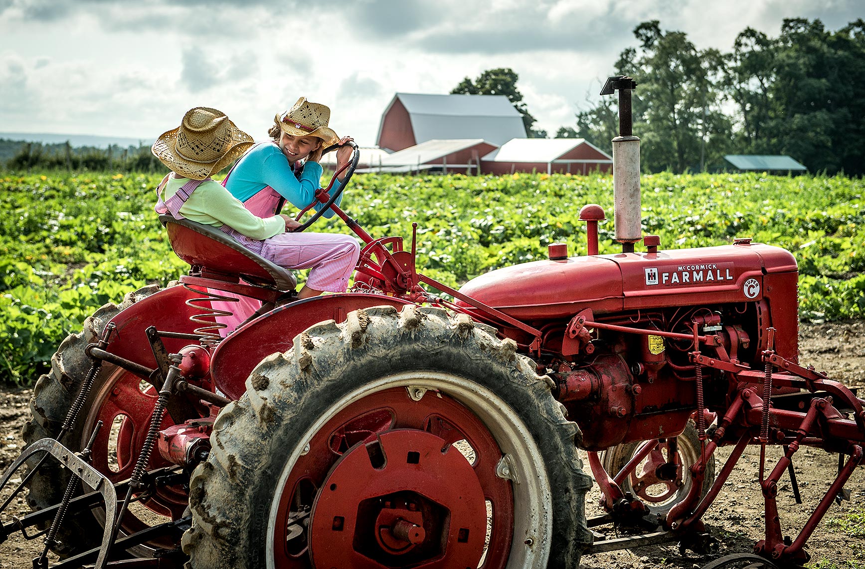 Twin Girls on Tractor 