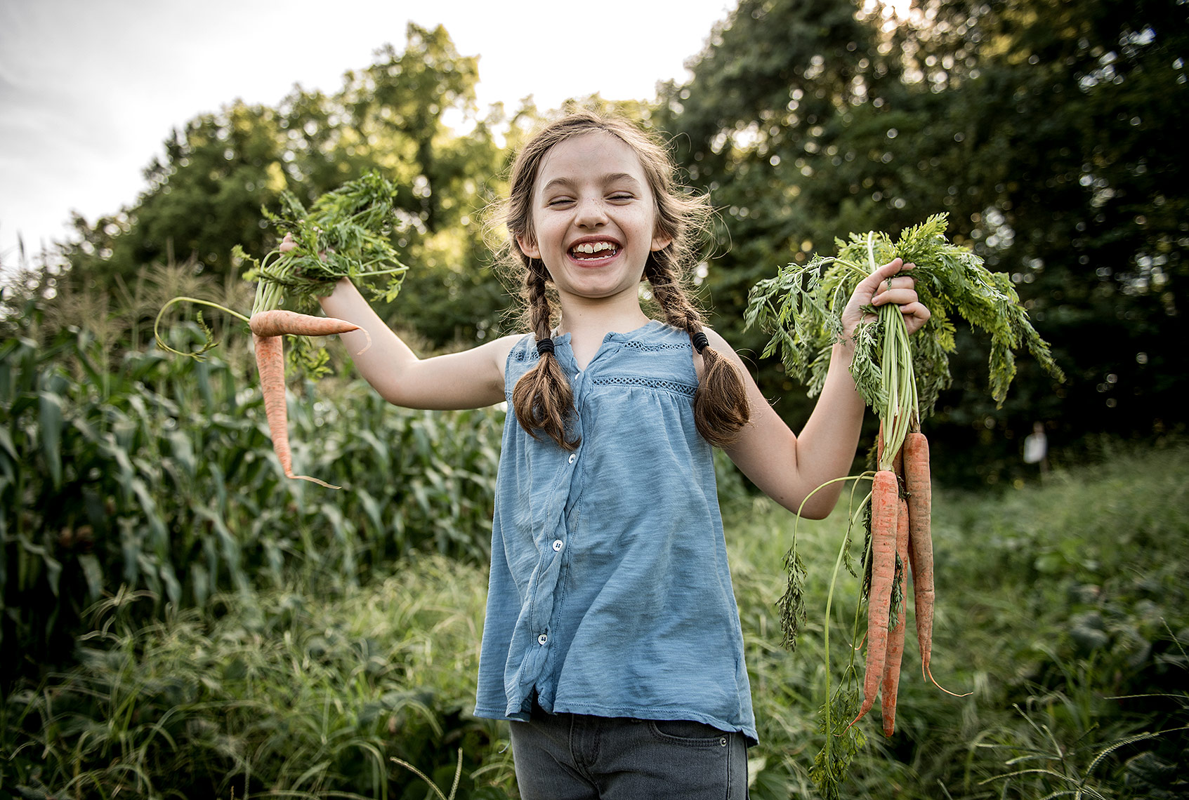 Girl in the Garden with Carrots